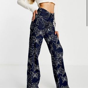 Jaded London low rise boyfriend fit denim jeans in embossed butterfly